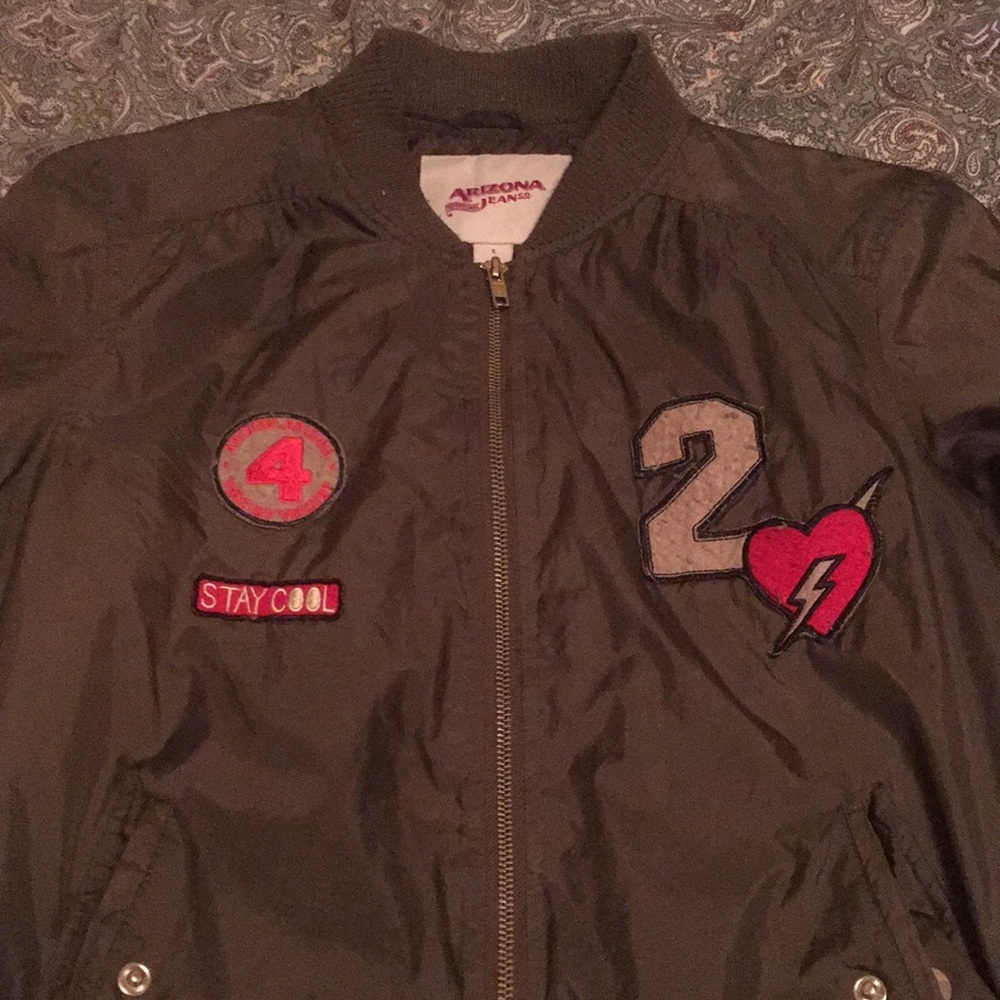 Olive green bomber jacket with patches